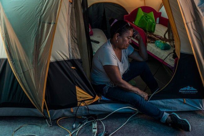 Climate Change Woman Tent Puerto Rico 1500x1000.jpg