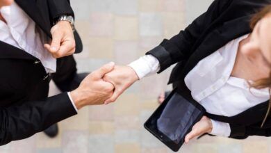 Business people shaking their hands.jpg