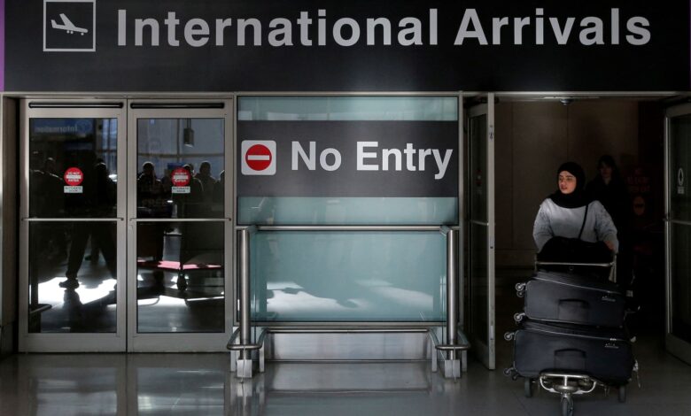 108117098 17422358872025 03 17t172634z 471340172 rc24fdaa5o38 rtrmadp 0 usa migration doctor rhode i.jpeg